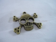 1 CALAVERA BRONCE ANTIGUO 26x31 mm