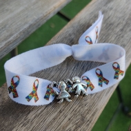 Pulsera elstica nios estampado puzle lazos