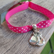 Pulsera castauelas cinta de lunares fucsia