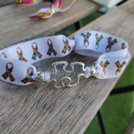 Pulsera elstica puzle estampado lazos