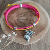 Pulsera taurina con cordn de antelina y colgante chaqueta torera y montera