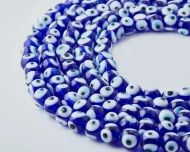 Tira de bolas lisas de cristal Ojo turco azul - 12 a 14mm